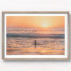Buy fine art framed print of surfers and woman watching sun rise over Bondi Beach. Silhouettes, golden beach, beautiful Bondi, Sydney Australia