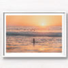 Buy fine art framed print of surfers and woman watching sun rise over Bondi Beach. Silhouettes, golden beach, beautiful Bondi, Sydney Australia