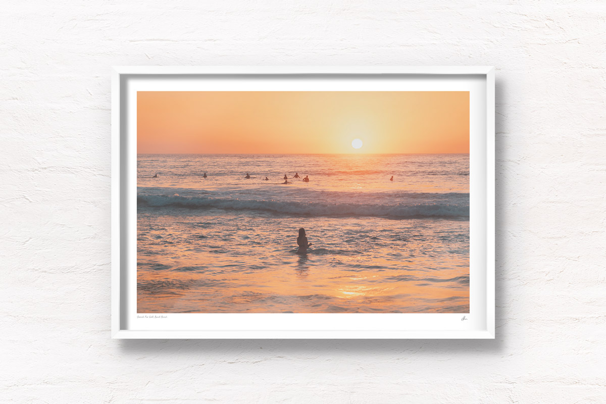 Buy fine art framed print of surfers and woman watching sun rise over Bondi Beach. Silhouettes, golden beach, beautiful Bondi, Sydney Australia