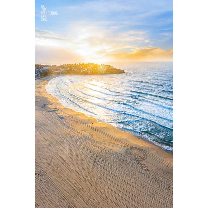 Sunrise Ben Buckler Bondi. Person alone on Bondi Beach.