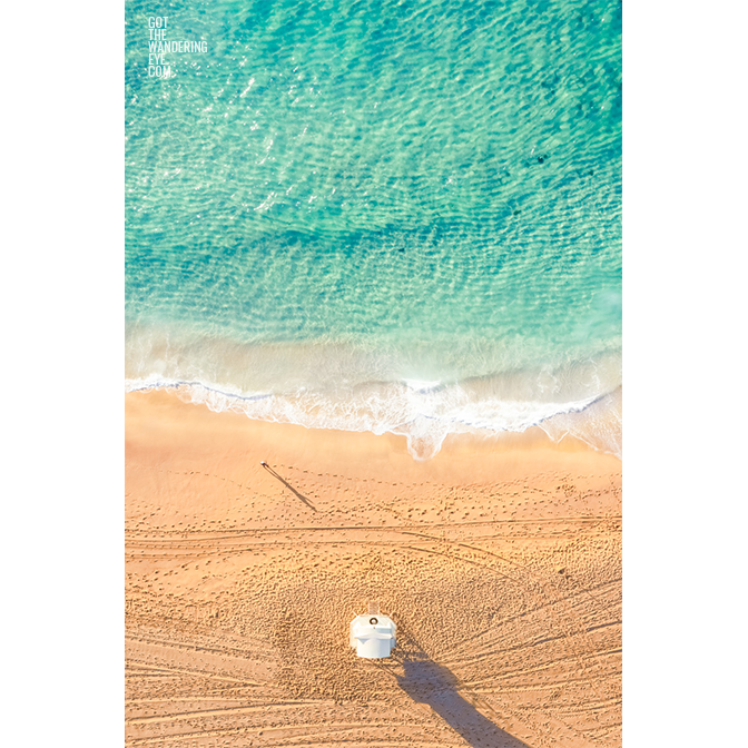 Birds eye view above the patrol tower at Bondi Beach at sunrise.