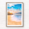 Long exposure of crashing waves flowing onto Tamarama Beach as a sparkling sunrises over Tamarama Surf Life Saving Club.