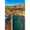 Swimmers enjoying morning laps at Wylies Baths, Coogee