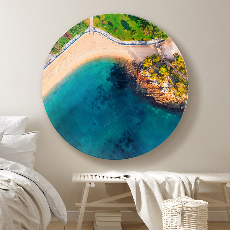 ChromaLuxe round metal wall art ocean prints. Aerial oceanscape above Balmoral Beach promenade in the morning. Refreshing artwork for the bedroom. Wall art delivered and ready to hang.