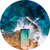 Ocean Aerial North Cronulla Rockpool. ChromaLuxe round metal print of the ocean. Aerial oceanscape above North Cronulla rockpool, as waves crash over from the beach. Wall art delivered and ready to hang.
