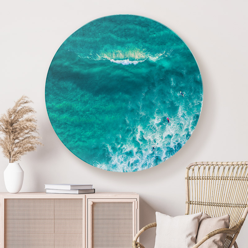 ChromaLuxe round metal wall art ocean prints. Aerial oceanscape above surfers approaching a glassy wave at Maroubra Beach. Wall art delivered and ready to hang.