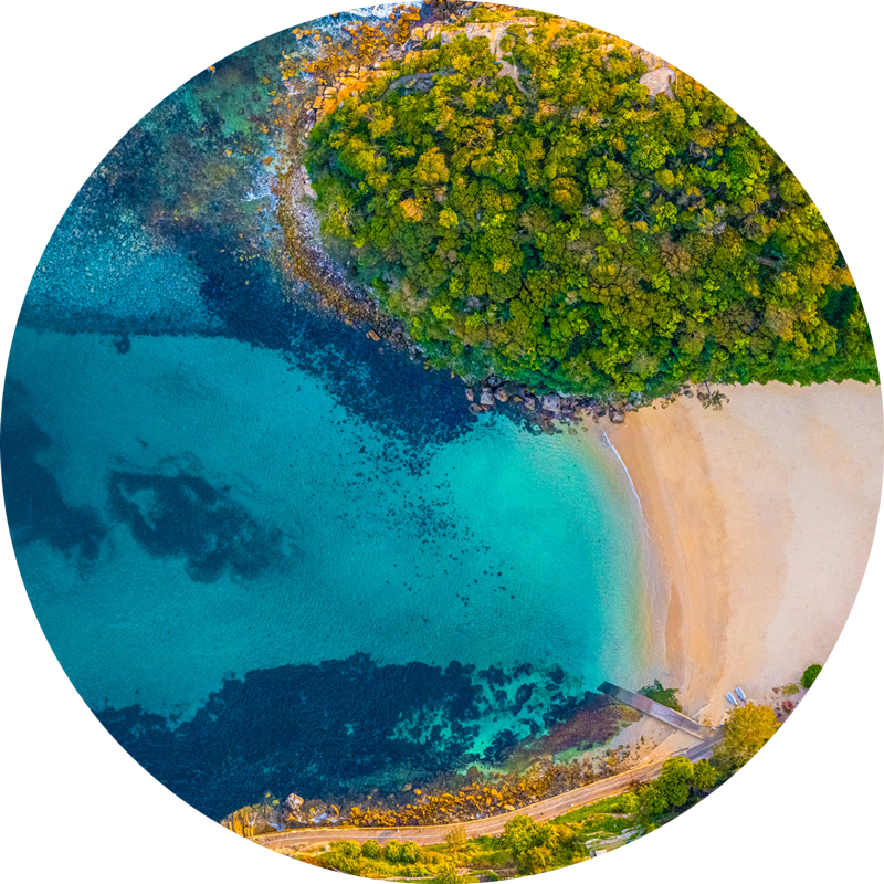 Ocean Aerial Shelly Beach. ChromaLuxe round metal print of the ocean. Aerial oceanscape above an empty Shelly Beach and Shelly Head Lookout, Manly in the morning. Wall art delivered and ready to hang.