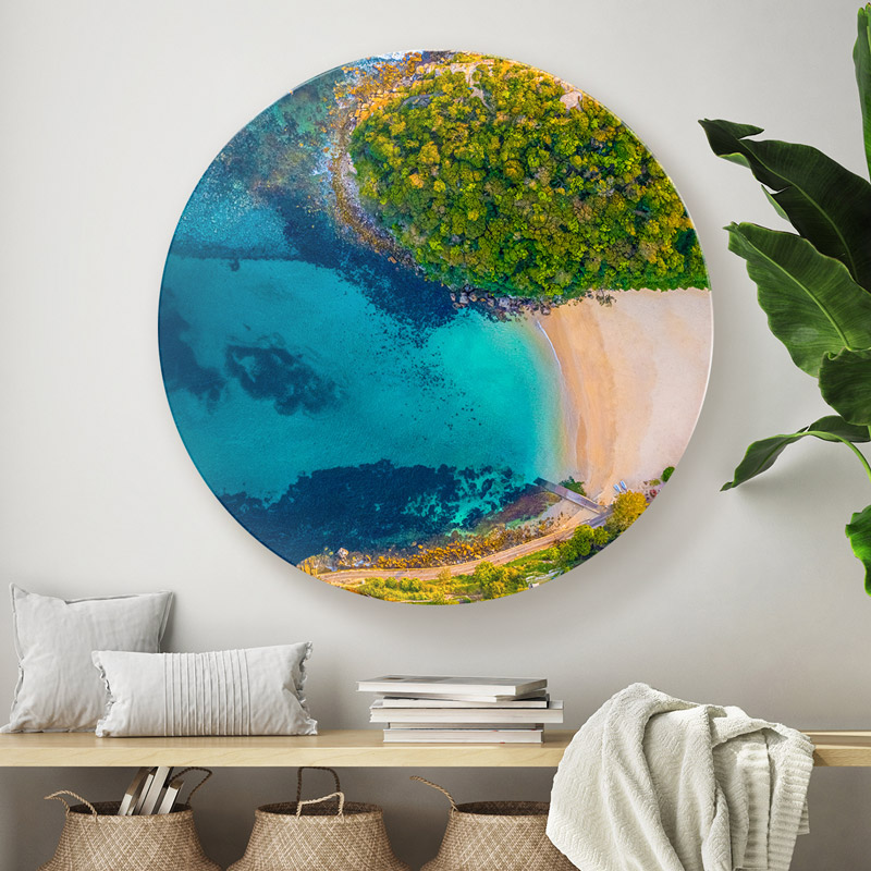 ChromaLuxe round metal wall art ocean prints. Aerial oceanscape above an empty Shelly Beach and Shelly Head Lookout, Manly in the morning. Wall art delivered and ready to hang.