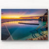 Gorgeous rainbow coloured sunrise over an empty Bronte Baths Rockpool
