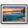 Gorgeous rainbow coloured sunrise over an empty Bronte Baths Rockpool