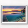 Gorgeous rainbow coloured sunrise over an empty Bronte Baths Rockpool
