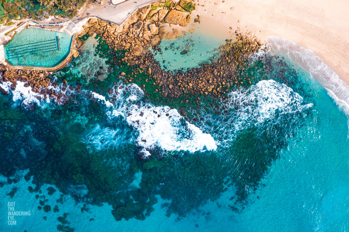 Crystal clear blue waters of Bronte beach baths and rockpool on a clear beautiful day.