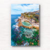 Framed wall print of a swimming in bronte rockpool, bronte baths on a sunny day at at low tide