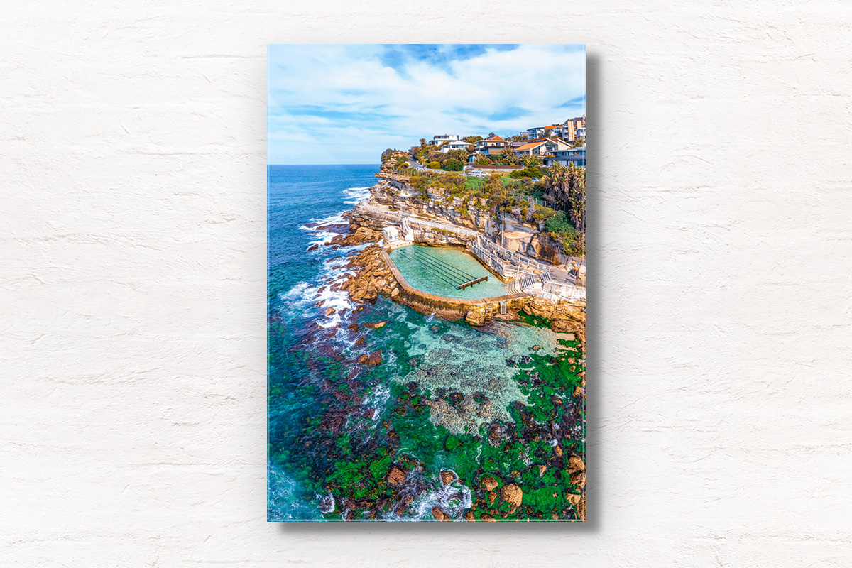 Framed wall print of a swimming in bronte rockpool, bronte baths on a sunny day at at low tide