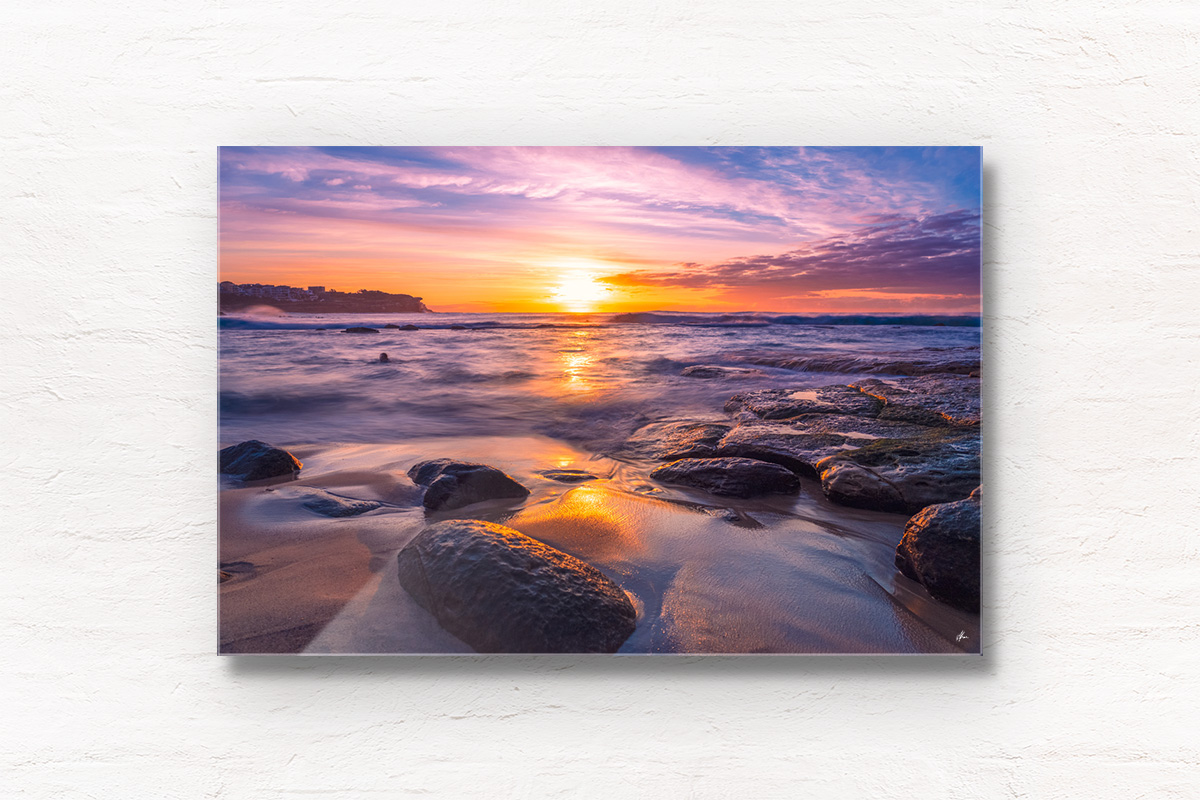 Framed wall print of a swimmer enjoying a beautiful purple sky sunrise over the Bogey Hole at Bronte Beach