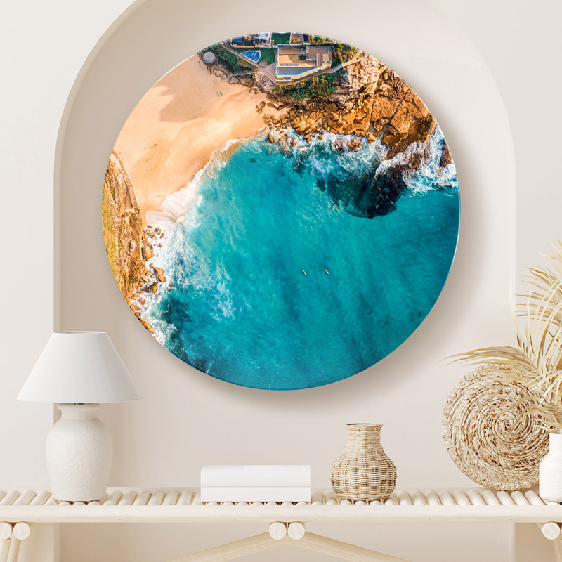 ChromaLuxe round metal wall art ocean prints. Aerial oceanscape above Tamarama (glamarama) Beach and surf life saving club. Wall art delivered and ready to hang.