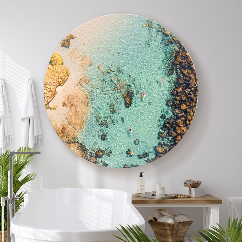 Interior styling inspiration. ChromaLuxe round metal print of the Bronte Bogey Hole at Bronte Beach hanging in modern bathroom