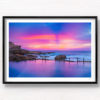 Framed wall art print of a pink and purple aurora sky, over a empty still Mahon Pool, Maroubra