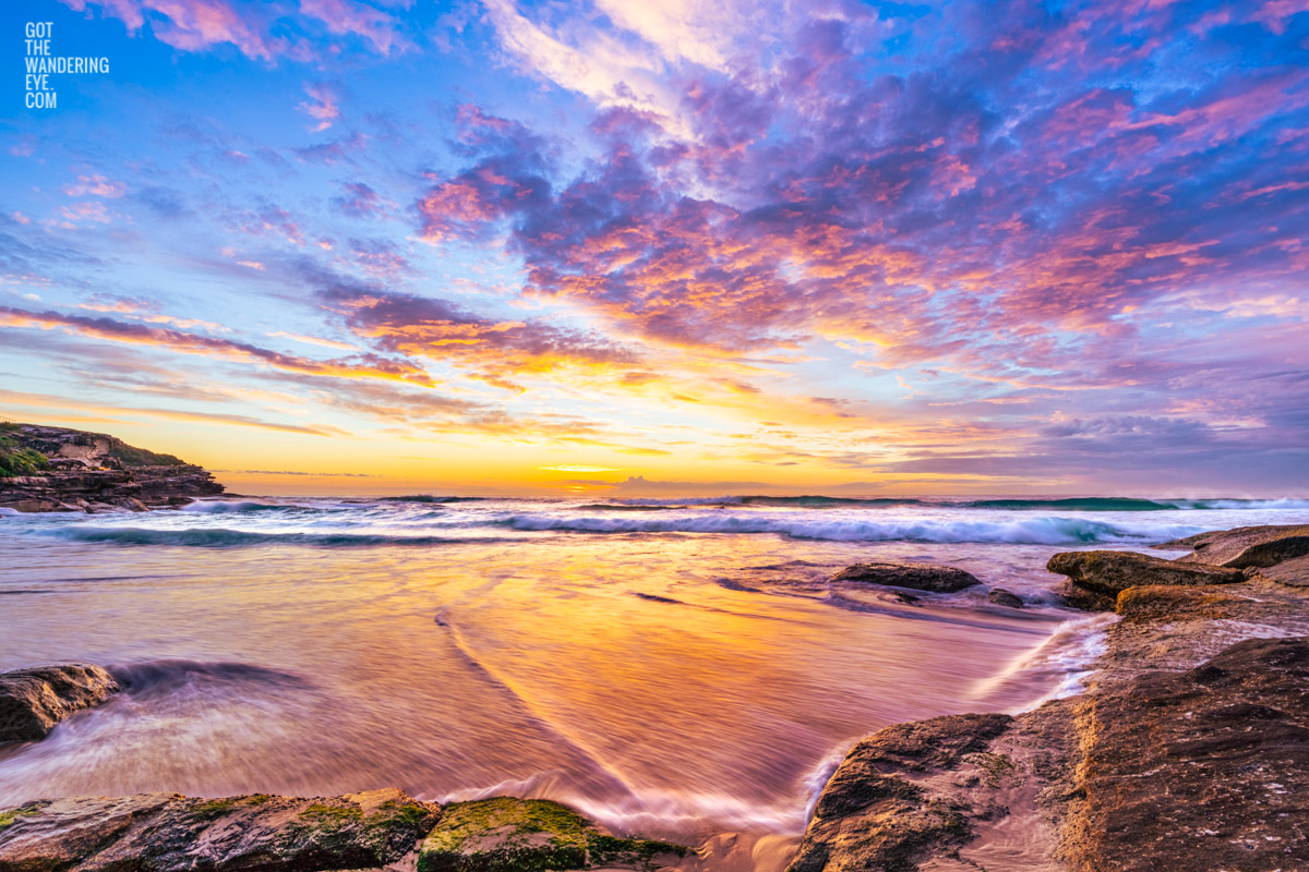 Beautiful Tamarama Beach Sunrise. Incredibly beautiful puffy cloud sky sunrise at 6am at Tamarama Beach