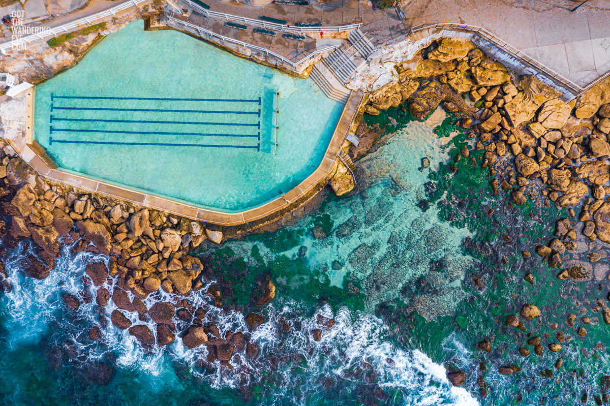 Aerial view above the iconic Bronte rock pool. One of Sydneys best ocean pools to enjoy in summer.