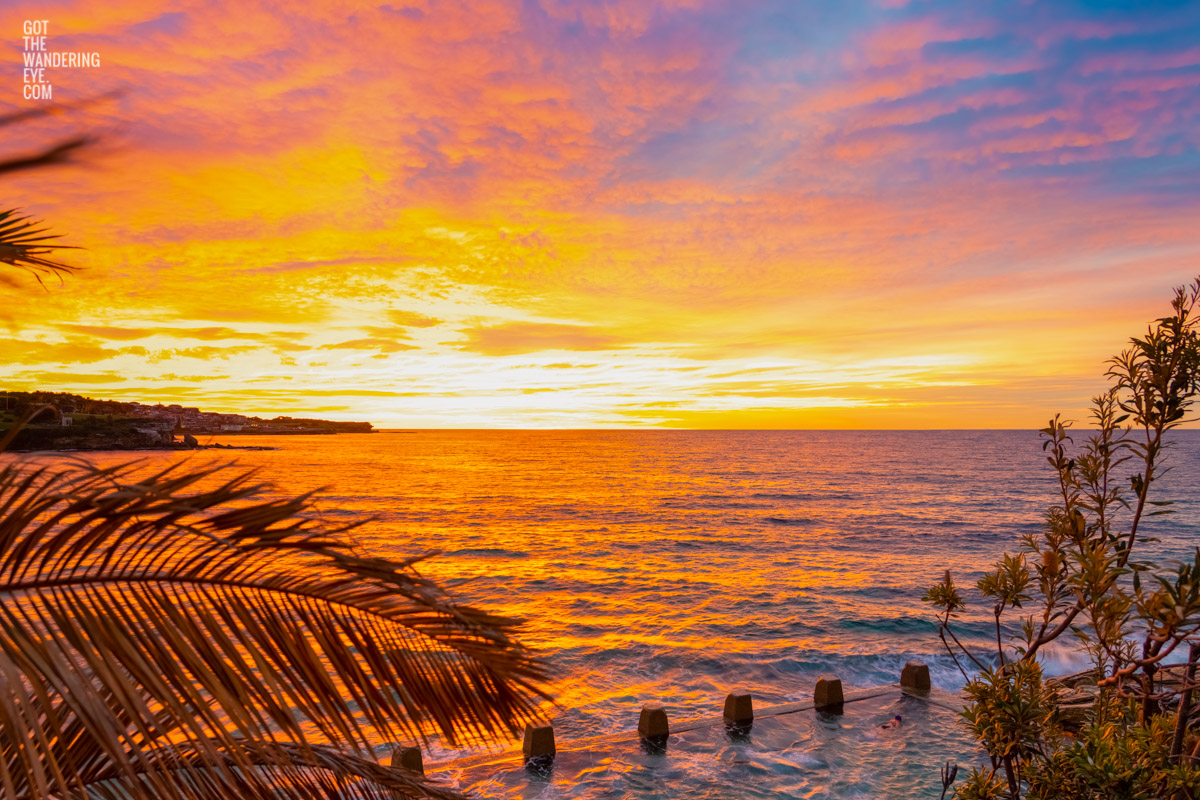 Coogee Beach Morning Sunrise from one of Sydney’s best sunrise locations. Warm golden sunrise beach photography by Allan Chan.