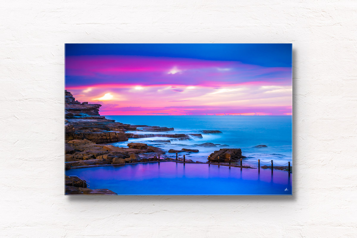 Neon purple and blue Mahon Pool Sunrise Glow at Maroubra.