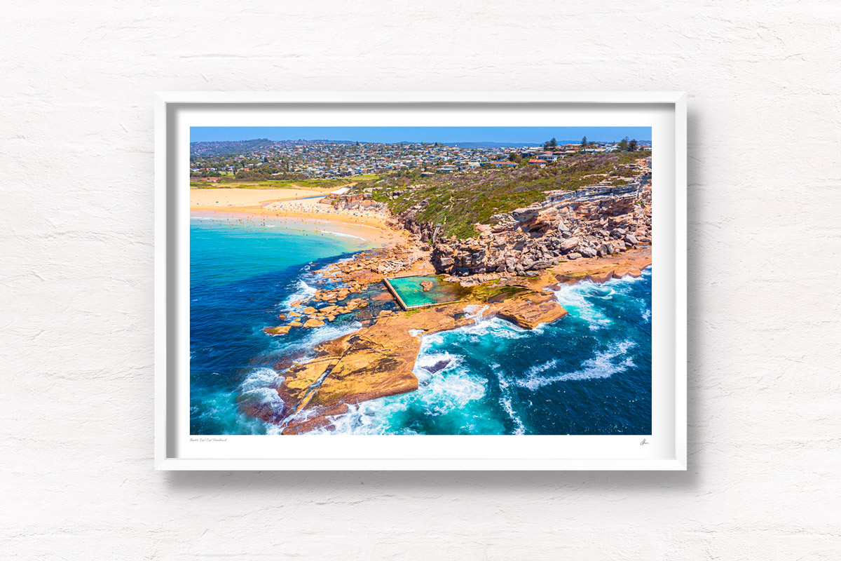 North Curl Curl aerial above the headland and one of Sydney’s best ocean rock pools. Located in the Northern Beaches.