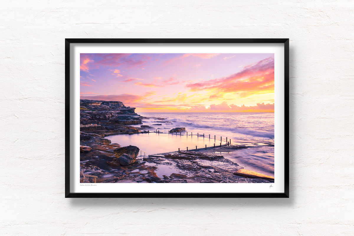 Early morning pastel coloured sunrise at Mahon Pool, Maroubra. Sydney Ocean Pool in the eastern suburbs.