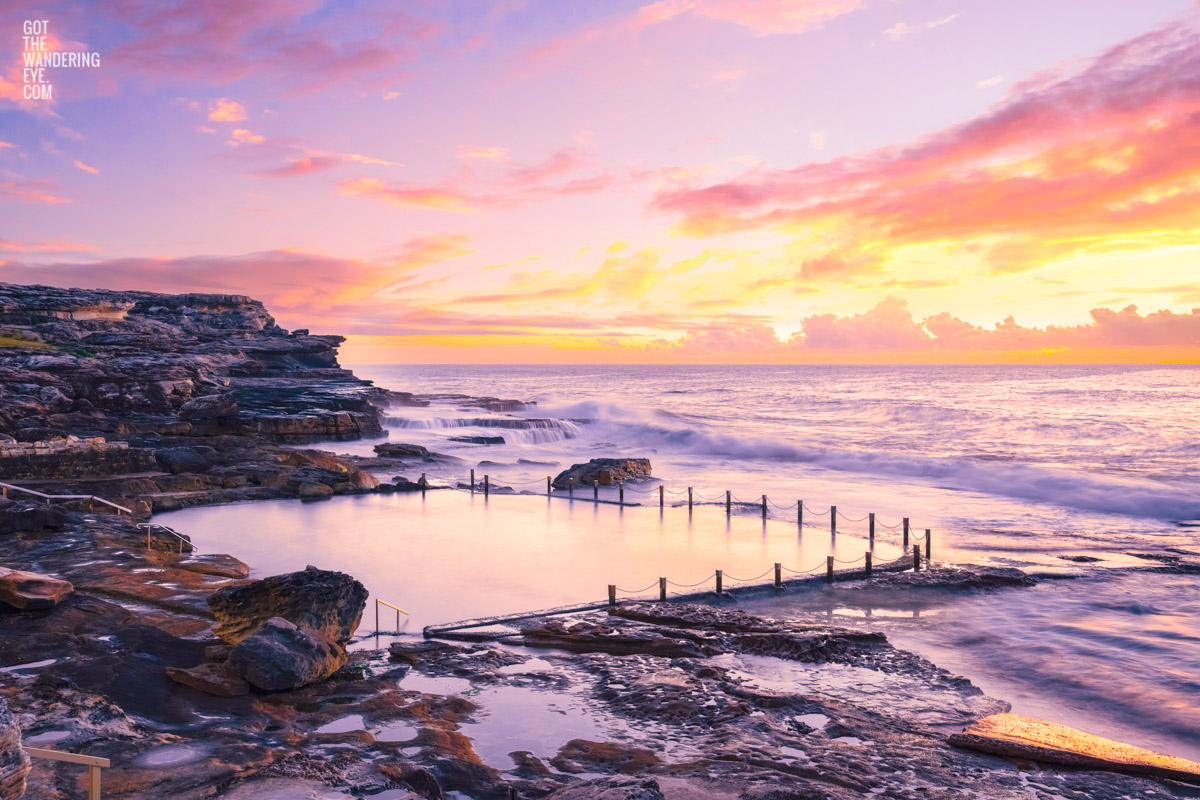 Early morning pastel coloured sunrise at Mahon Pool, Maroubra. Sydney Ocean Pool in the eastern suburbs.