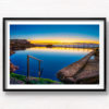 Sunrise at Sydney's Best Ocean Pool. Reflections on an empty still rock pool at Mahon Pool Maroubra by Allan Chan.