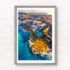 Waterfront North Bondi Aerial over flat rock overlooking North Bondi boat ramp during a warm sunny morning sunrise.
