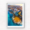 Waterfront North Bondi Aerial over flat rock overlooking North Bondi boat ramp during a warm sunny morning sunrise.