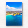 Aerial birds eye view looking back towards the Coogee Cliffs and dolphin point in Sydney. Clear blue sky summers day.