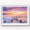 Cotton candy puffy pink clouds at a beautiful Sunrise at Coogee Beach from Ross Jones memorial ocean pool in Sydney.