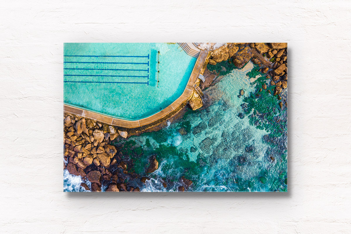 Bronte Baths Aerial View. Crystal clear water on one of Sydney’s most iconic swimming spots. A must visit during Summer. Framed wall art prints.