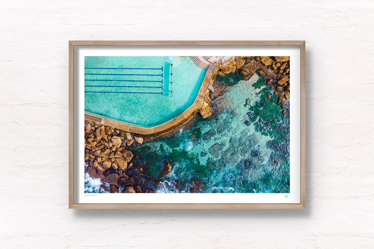 Bronte Baths Aerial View. Crystal clear water on one of Sydney’s most iconic swimming spots. A must visit during Summer. Framed wall art prints.
