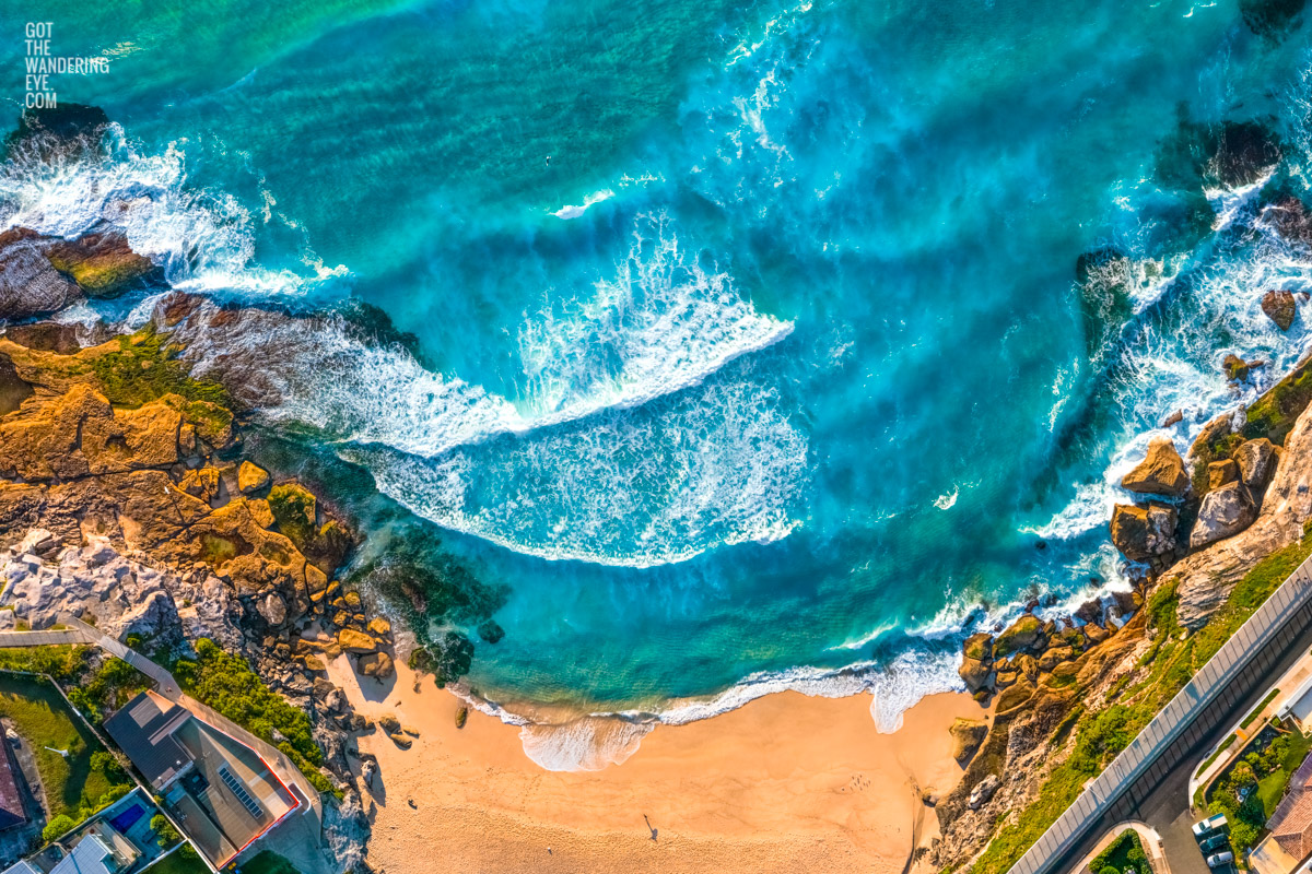 Tamarama Beach aerial view of a surfer ready to surf the large waves in Sydney’s Eastern Suburbs.