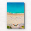 Aerial view above Coogee Beach Rainbow Walkway during a packed summers day at one of Sydney’s best beaches. Wall art print.