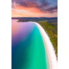 Beautiful view sunrise view above the idyllic white sand beach of Hyams Beach in Jervis Bay. Golden sunlight kissing the teal ocean.