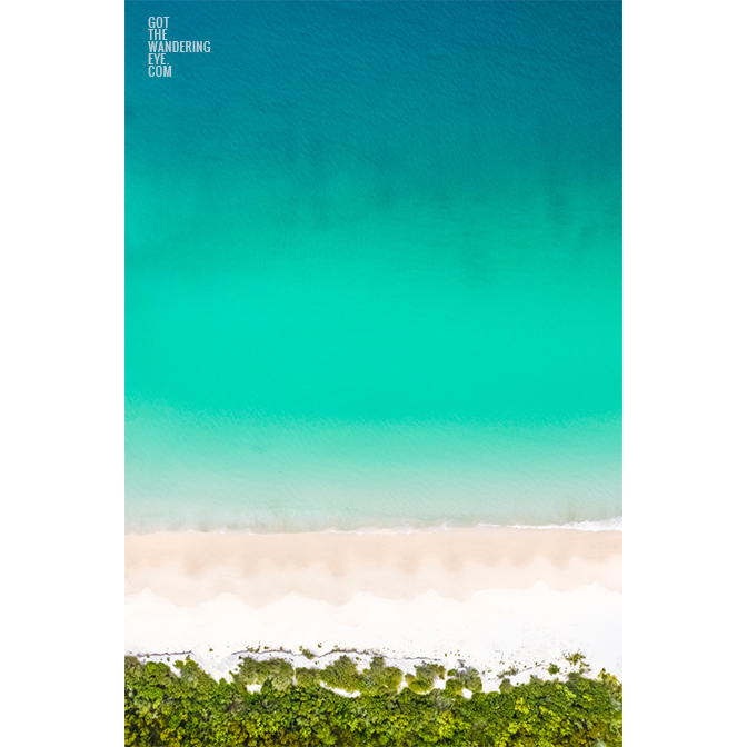 Beautiful white sand beach and clear teal ocean at an empty Hyams Beach, Jervis Bay.