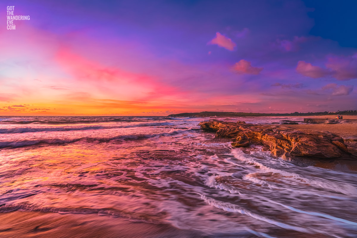 Multicolour Maroubra Beach sunrise. Beuatiful coloured skies above the rubiks cube.