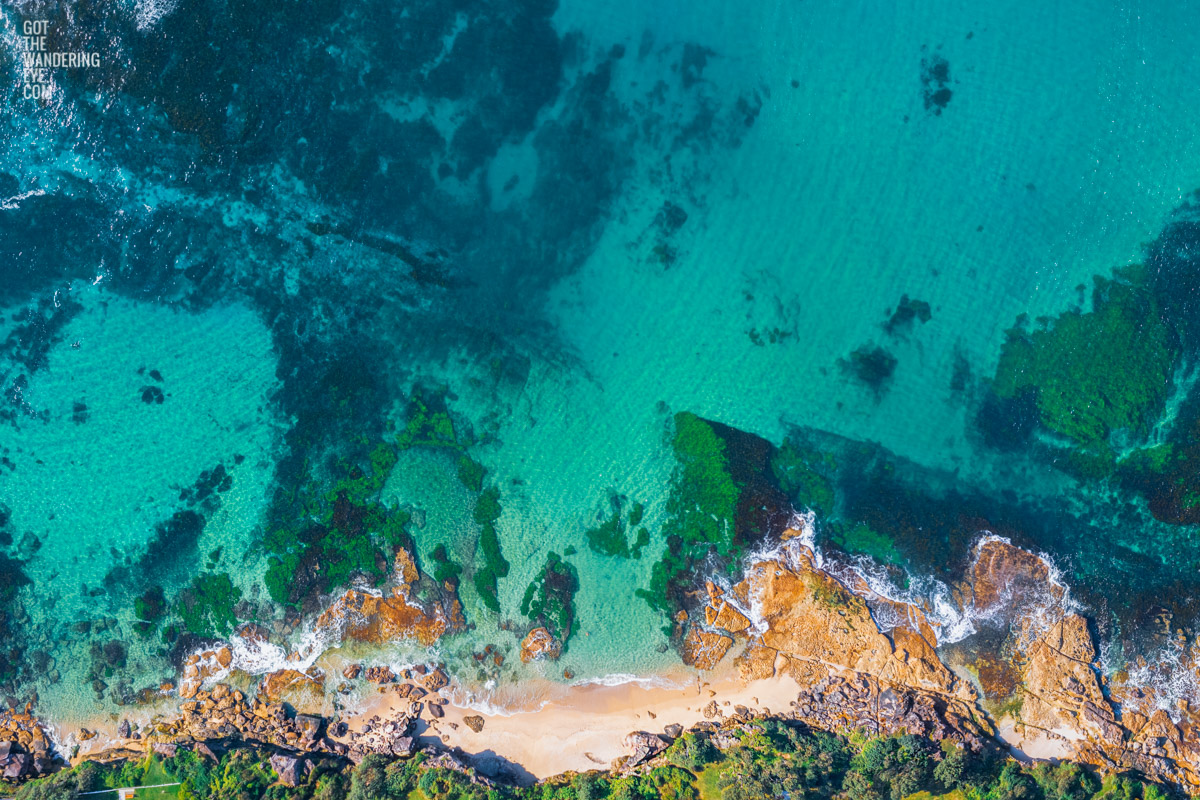Aerial photography above Blackwoods Beach Cronulla. Clear crystal waters in Gods Country.
