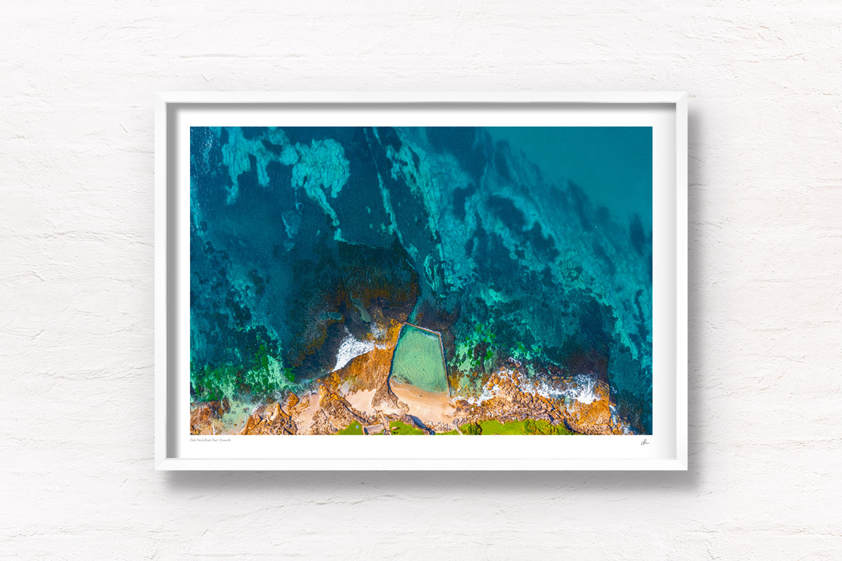 Aerial photography above a crystal clear Oak Park Rock Pool in Cronulla. Framed art photography wall art print.