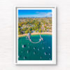 Aerial view above Balmoral Beach Wharf looking back towards the Sydney City skyline. Framed art photography wall art print.