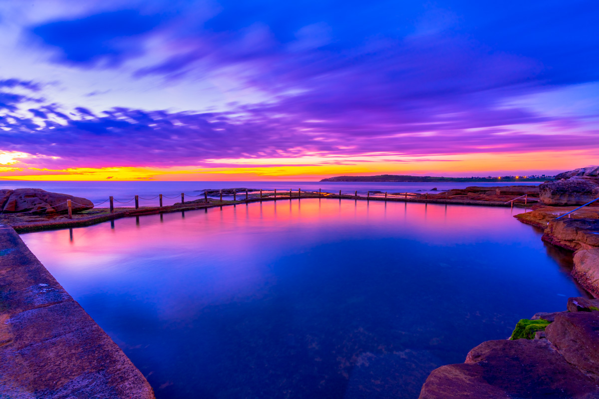 Purple dawn sunrise over Mahon Pool and Maroubra in Sydneys best sunrise location.