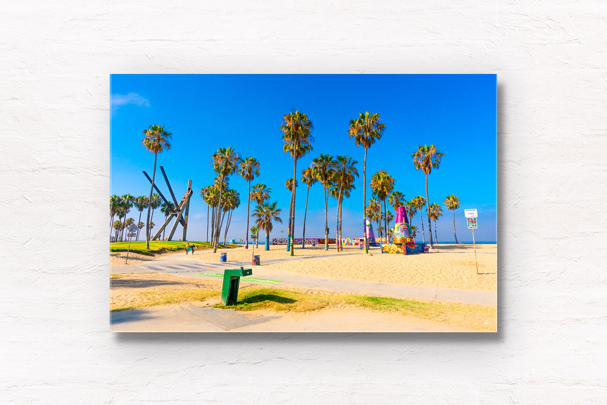 Surfers walking across the Venice Beach boardwalk in California. Framed art photography wall art print.