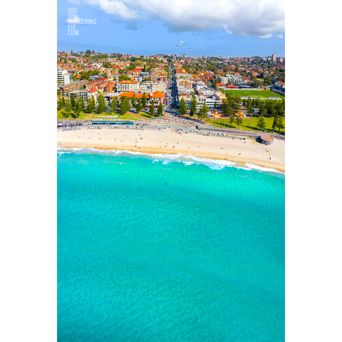 Aerial photography above turquoise clear ocean at Coogee Beach.