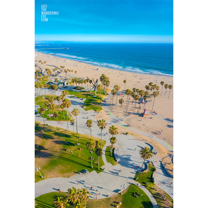 Aerial view above Venice Beach Boardwalk on a clear and sunny summers day.