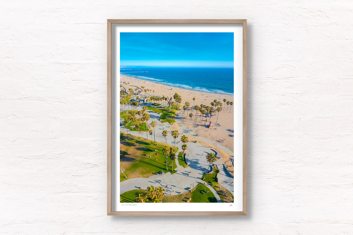 Aerial view above Venice Beach Boardwalk on a clear and sunny summers day. Framed art photography wall art print.