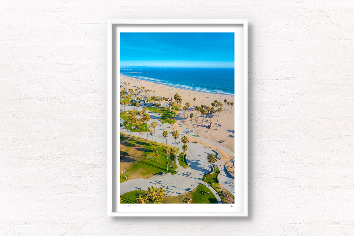 Aerial view above Venice Beach Boardwalk on a clear and sunny summers day. Framed art photography wall art print.